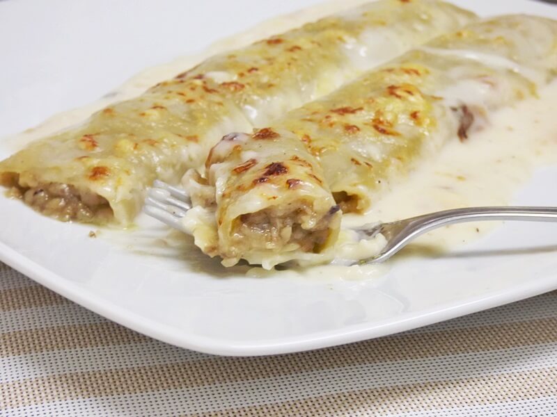 Canelones de manitas de cerdo y setas