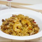 Arroz meloso con puntillas y langostinos